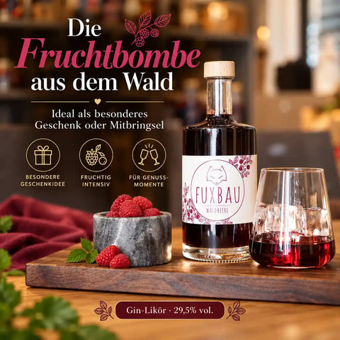 FUXBAU Waldbeere Gin-Likör mit Himbeeren und Glas – fruchtige Geschenkidee und besonderes Mitbringsel aus der Steiermark.